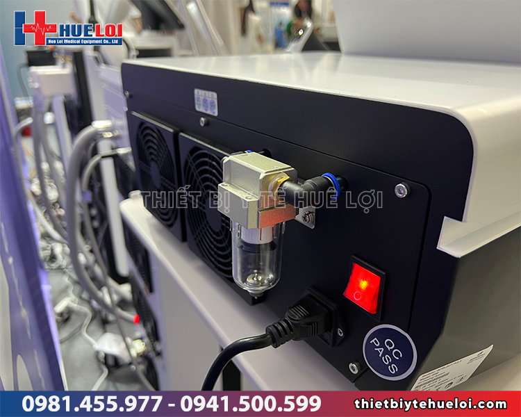 mặt sau máy xung kích